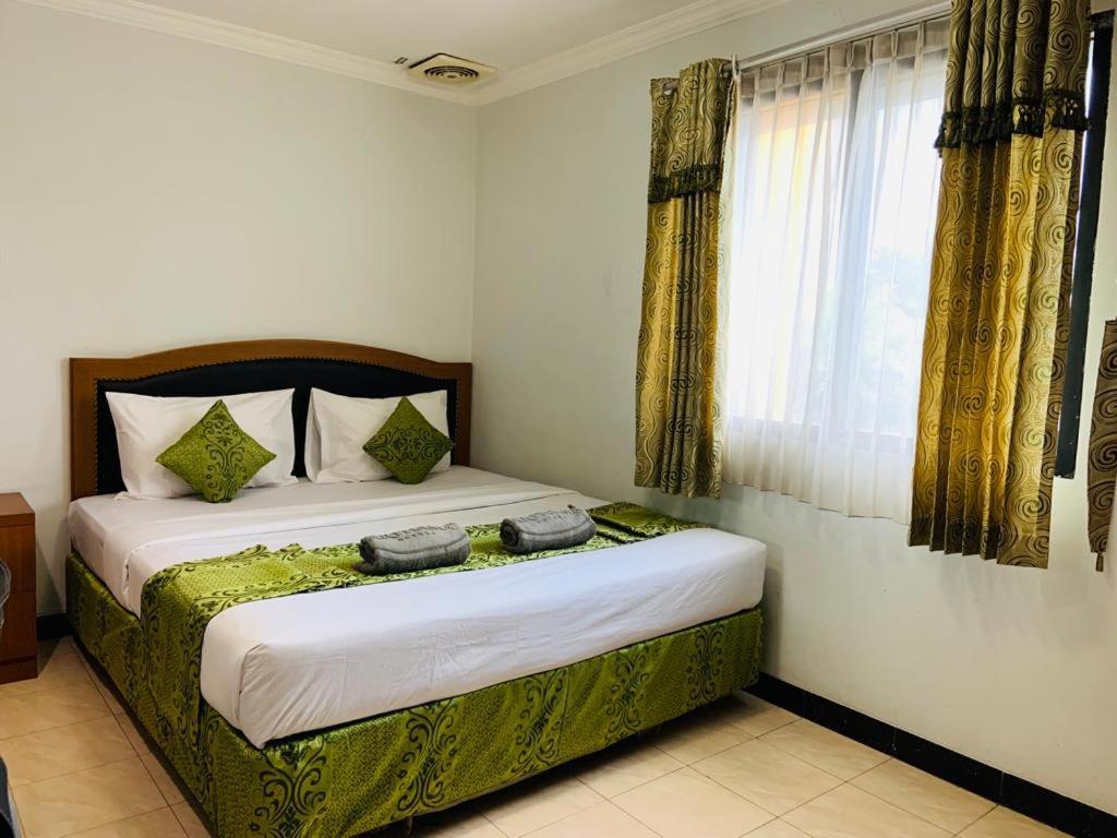 Karsa Utama Hotel Jakarta Buitenkant foto